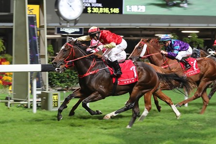 Brett Prebble celebrates as Super Fluke wins his third consecutive race in the first section of the Class 3 Irving Handicap