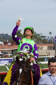 Javier Castellano celebrates winning the Breeders Cup Juvenile Fillies Turf atop Rushing Fall at Del Mar on November 3, 2017.