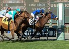 Midnight Crossing (inside) just holds off Elysea's World to win the Robert J. Frankel Stakes at Santa Anita Park