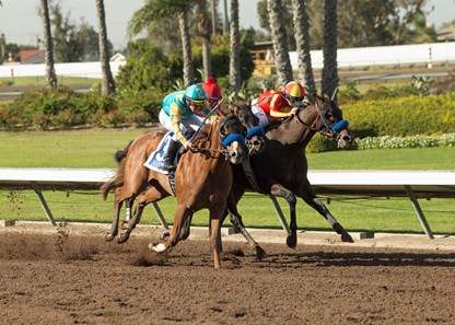 McKinzie (right) wins the Los Alamitos CashCall Futurity Stakes via DQ