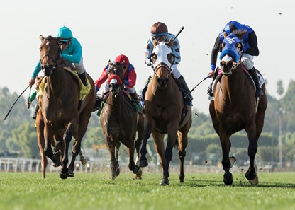Midnight Crossing and jockey Brice Blanc, right, outleg Elysea's World (Javier Castellano), left, Gliding By (Rafael Bejarano), second from left, and Laseen (Victor Espinoza), third from left, to win the G3, $100,000 Robert J. Frankel Stakes, Saturday, December 30, 2017 at Santa Anita Park, Arcadia CA.