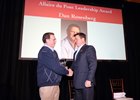 Dan Rosenberg (left) receives the Allaire du Pont Leadership Award from Thoroughbred Charities of America president Mike McMahon