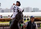 Javier Castellano reacts after winning the La Prevoyante aboard Texting at Gulfsteam Park