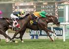 Om holds off Bowies Hero and Next Shares to win the Thunder Road Stakes at Santa Anita Park