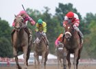 Blind Luck (outside) wins the 2010 Alabama Stakes over Havre de Grace (inside) at Saratoga Race Course