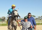 Jorge Navarro (right) walks to the winner's circle with X Y Jet after the Pelican Stakes at Tampa Bay Downs