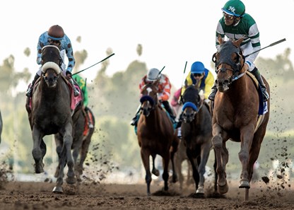 Hronis Racing's Accelerate and jockey Victor Espinoza, right, outrun the field to win the G2, $200,000 San Pasqual Stakes, Saturday, February 3, 2018 at Santa Anita Park, Arcadia CA.
