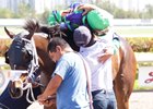 Javier and Abel Castellano embrace after Nothins Free's win