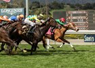 Belvoir Bay (inside) holds off a host of closers to win the Mizdirection Stakes at Santa Anita Park