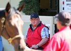 Eddie Woods inspects a youngster at the OBS March sale