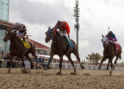 Chocolate Martini and Mitchell Murrill beating Eskimo Kisses in the Twinspires.com Fairgrounds Oaks at Fairgrounds Race Course on March 24, 2018.