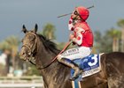 Midnight Bisou and Mike Smith after winning the April 7 Santa Anita Oaks at Santa Anita Park