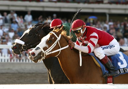 Wynn Dot Comma (right)#3 with Edgar Prado scoring his 5,000 career victory over Eurosilver and Javier Castellano in the $150,000 Swale Stakes at Gulfstream Park.