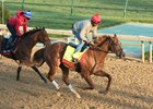 Flameaway clears workmate Ride a Comet while clocking five furlongs in 1:00 2/5 at Churchill Downs