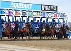 Winner Vino Rosso breaks from the far outside post 9 in the Wood Memorial at Aqueduct Racetrack