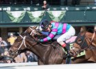 Finley'sluckycharm gets her head in front at the wire in the Madison Stakes at Keeneland