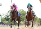 City of Light (outside) edges Accelerate by a neck to win the Oaklawn Handicap at Oaklawn Park