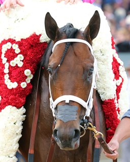 City of Light in the winner's circle after taking the Oaklawn Handicap at Oaklawn Park