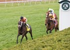 Triple Chelsea leaves Lady Aurelia (No. 8) in her wake in the Giant's Causeway Stakes at Keeneland
