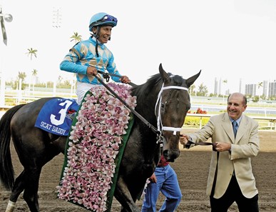 31 Mar 2007: Owner Michael Tabor guides Scat Daddy (3) with jockey Edgar Prado into the winners circle after winning the $1,000,000 Florida Derby at Gulfstream Park in Hallandale Beach, Florida. Photo By Bill Denver/EQUI-PHOTO