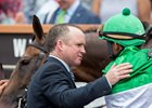 Brendan Walsh greets John Velazquez and Proctor's Ledge after the Churchill Distaff Turf Mile at Churchill Downs