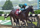 Abyssinian cruises to a seven-length win under a hand ride at Belmont Park