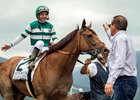 Victor Espinoza returns aboard Accelerate after winning the Gold Cup at Santa Anita Park