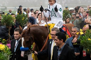 Justify with jockey Mike Smith enters the winner's circle after winning the 143rd running of the Preakness Stakes