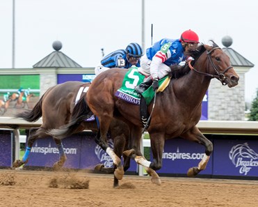 Runhappy and jockey Edgar Pardo win the Breeders' Cup Sprint at Keeneland on October 31, 2015.
Photo By: Anne M. Eberhardt