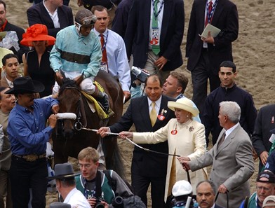 The Belmont States Rick Samuels PhotoBirdstone and Edgar Prado are led by owner Mary Lou Whitney, tan dress, after winning the Belmont Stakes June 5, 2004.