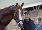 Justify and Jimmy Barnes, with co-owner Jack Wolf of Starlight Racing in the background, May 10 at Churchill Downs