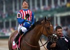 Jose Ortiz gives thanks after riding American Gal to victory in the Humana Distaff at Churchill Downs