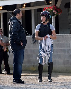 Mike Repole, left, with exercise rider Adele Bellinger who rides Vino Rosso. Morning scenes on May 2, 2018 Churchill Downs in Louisville, Ky.