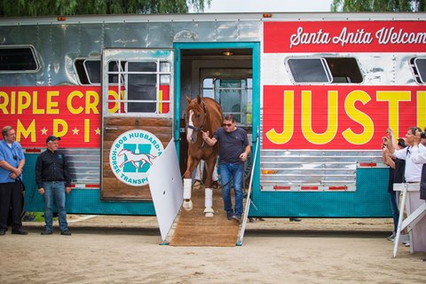 Justify arrives at Santa Anita and led by assistant trainer Jimmy Barnes