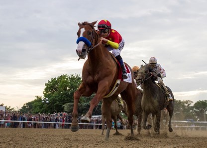 Justify and Mike Smith heading down the stretch in the Belmont Stakes at Belmont Park on June 9, 2018.