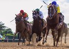 Bee Jersey and Ricardo Santana, Jr. winning The Runhappy Metropolitan at Belmont Park on June 9, 2018.