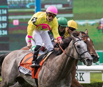 A Raving Beauty with jockey Irad Ortiz Jr. wins the 25th running of The Longines Just A Game (GI) at Belmont Park Saturday June 9, 2018 in Elmont, N.Y