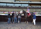 A few of Dream Bigger's connections gather for a winner's circle photo after his March 15 Damon Runyon Stakes score at a largely empty Aqueduct Racetrack