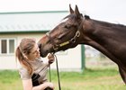 Bonnie McRae with one of the off-track Thoroughbreds at After the Races