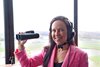 Jessica Paquette prepares for her first day as track announcer at Parx Racing in Bensalem, PA on November 15, 2022. Paquette is the first full-time female announcer in the United States. Photo by Nikki Sherman/EQUI-PHOTO.