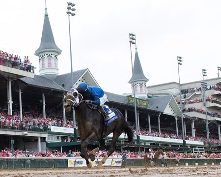 First Mission pulls away to score beneath the twin spires in the Alysheba Stakes at Churchill Downs