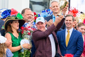 Lance Gasaway, center, and Sharilyn Gasaway, celebrate winning the Kentucky Derby