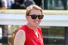 Trainer Lindsay Schultz is all smiles after Girl Named Charlie #4 with Fernando Jara riding won the $100,000 Miss Liberty Stakes at Monmouth Park on Sunday May 26, 2024. Photo By Bill Denver/EQUI-PHOTO.