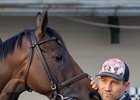 KY Derby 150 hopeful Honor Marie gets some loving from trainer Whit Beckman before his goes out for his morning gallop at Churchill Downs May 1, 2024 in Louisville, KY. Photo by Skip Dickstein