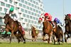 Jockey Vincent Cheminaud guides #14 Truly Quality to victory in the $175,000 HPI bet Singspiel Stakes at Woodbine. Owned by Augustin stables and trained by Jonathan Thomas, Truly Quality covered the 1Mi.3/8 over the E.P.Taylor Turf course in 2.17.2. Woodbine/Michael Burns Photo