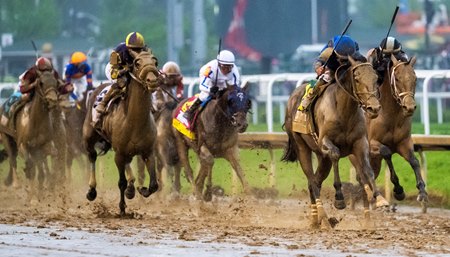 Sovereignty defeats Journalism (inside) and Baeza (far outside) in the Kentucky Derby at Churchill Downs