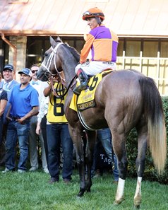 John Velazquez on the Todd Pletcher-trained Ted Noffey in the winner's circle after their Breeders' Futurity victory at Keeneland