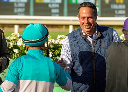 Phil D'Amato congratulates Umberto Rispoli after winning the Rodeo Drive Stakes at Santa Anita Park