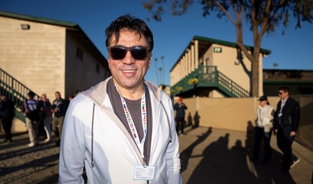 Kia Joorabchian enjoys a morning on the backstretch at Del Mar