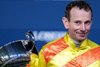 Ryan Moore with the trophy as winning jockey in the Longines International Jockeys Championship
Hong Kong 10.12.25 Pic: Edward Whitaker